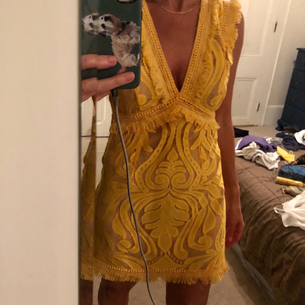 Yellow lace mini dress.